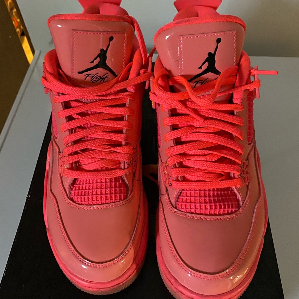 THE AIR JORDAN 4 “HOT PUNCH”